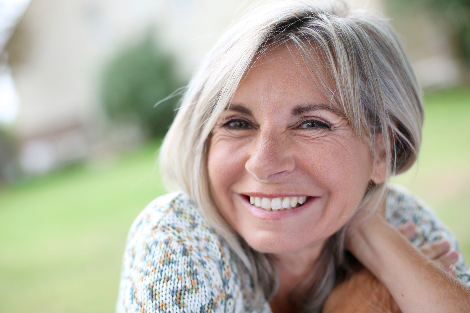 a person smiling for the camera