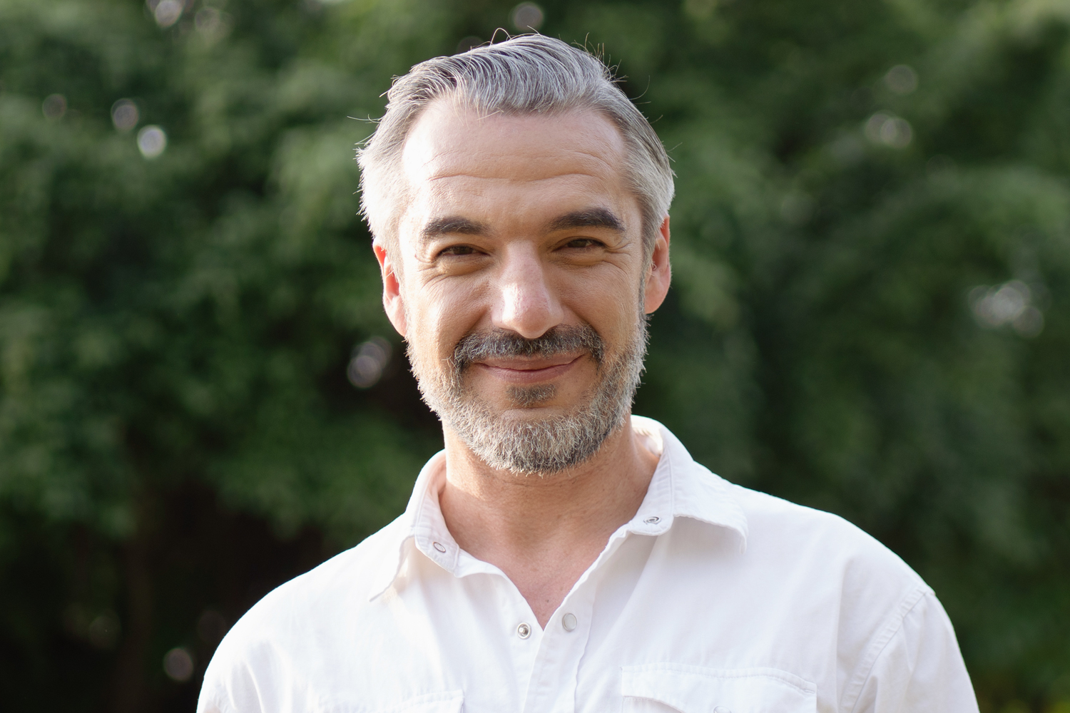 a man smiling for the camera
